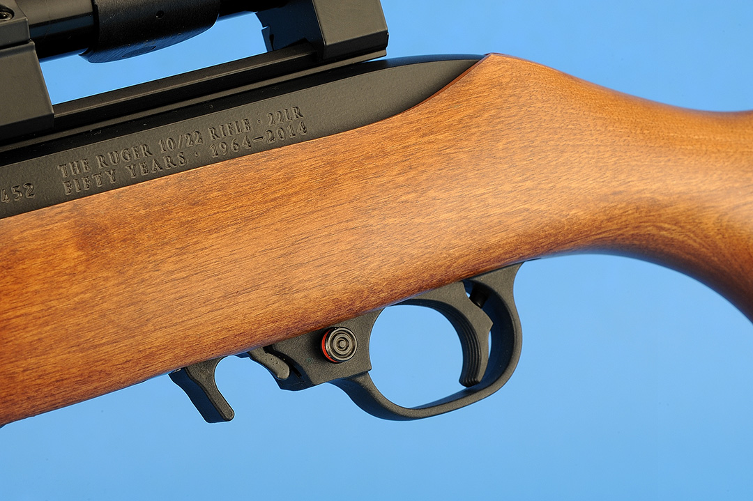 On the left side of the gun is the magazine release and the cross-bolt safety. Just in front of the safety is the bolt lock/release and the attention given to the finishing of the hardwood stock.